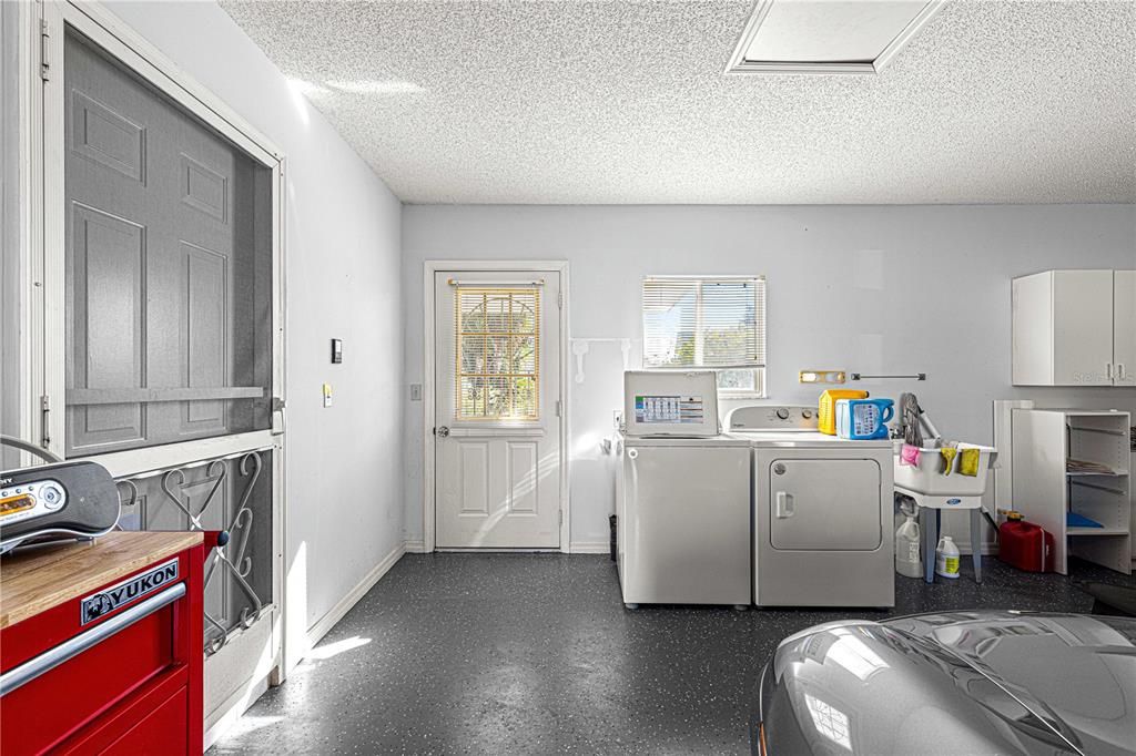 laundry in garage off kitchen