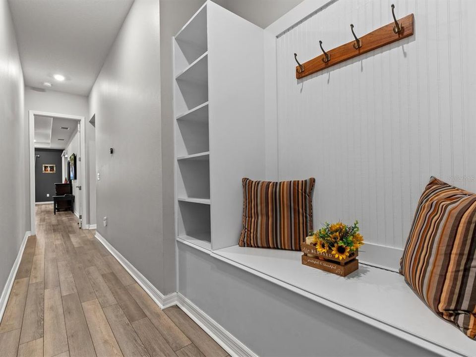 mudroom, hallway facing primary bedroom