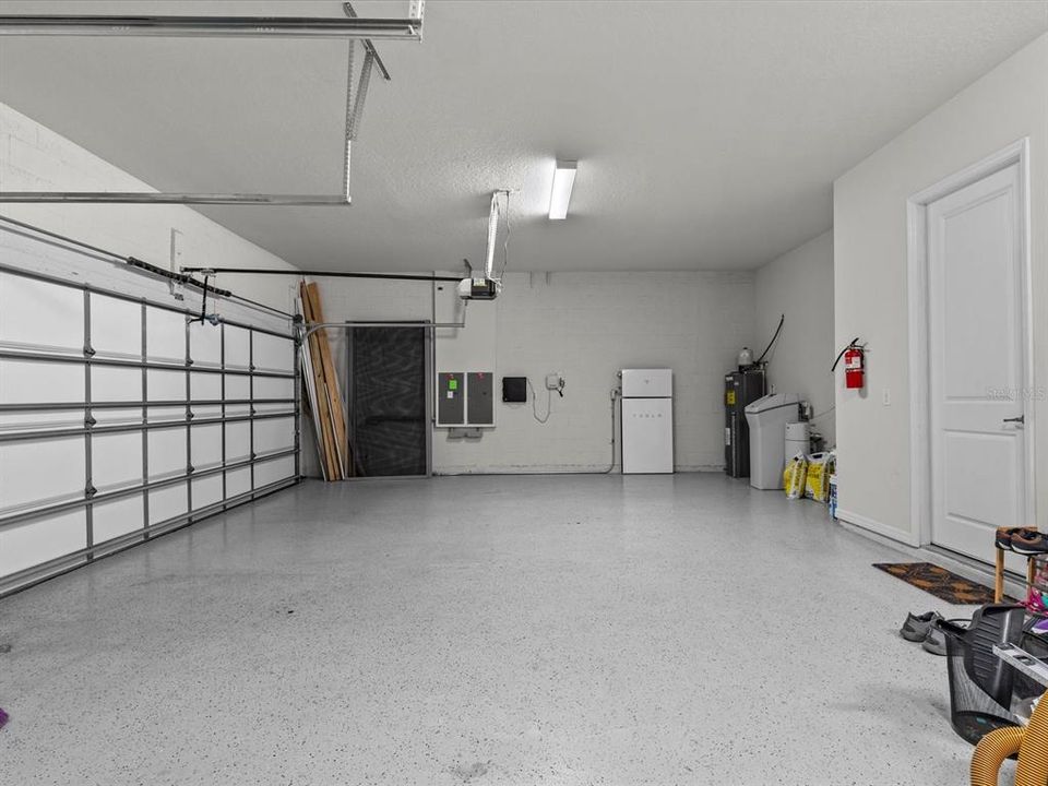 garage with additional storage space not pictured