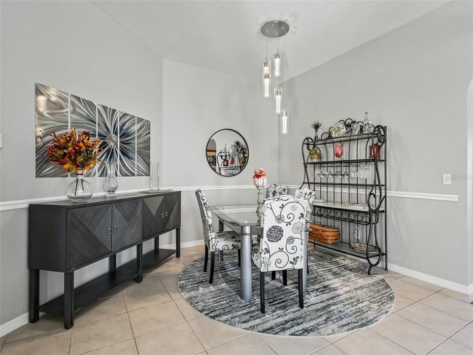 Dining area w/Designer light fixture