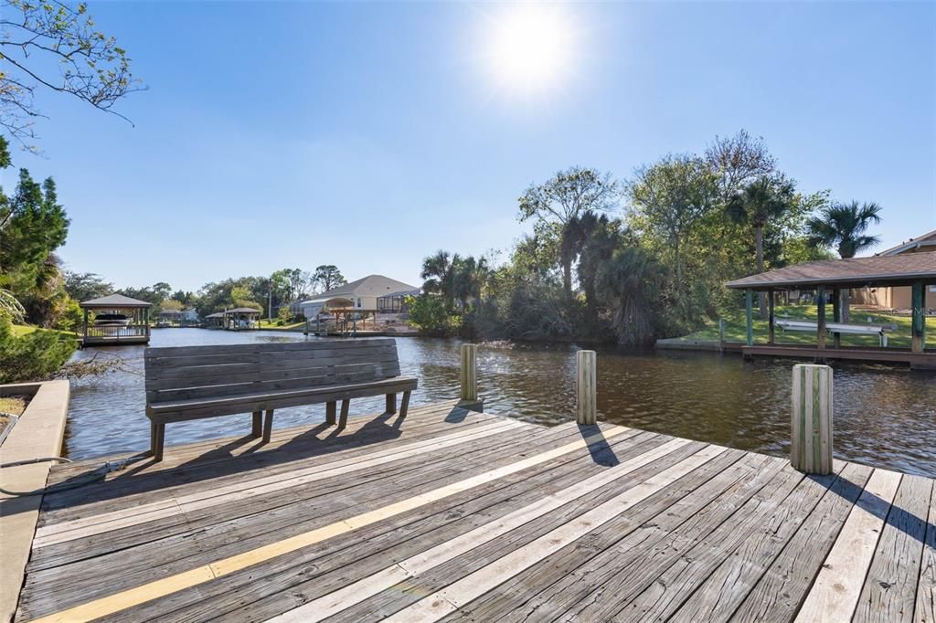 Dock with bench and boat lift