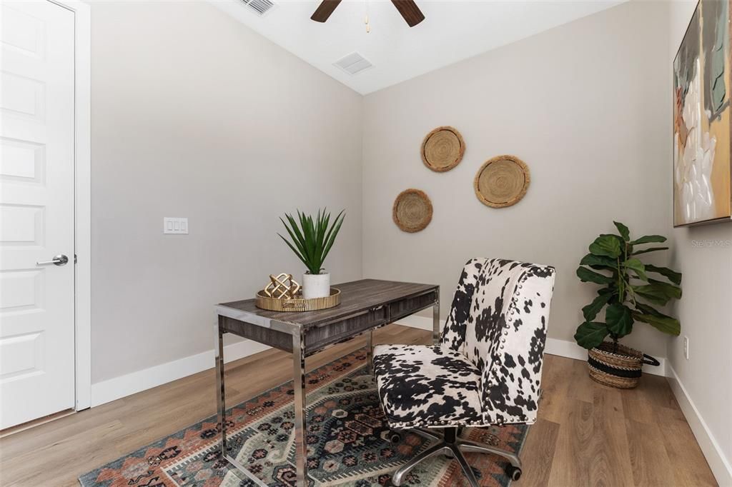 Downstairs bedroom staged as an office