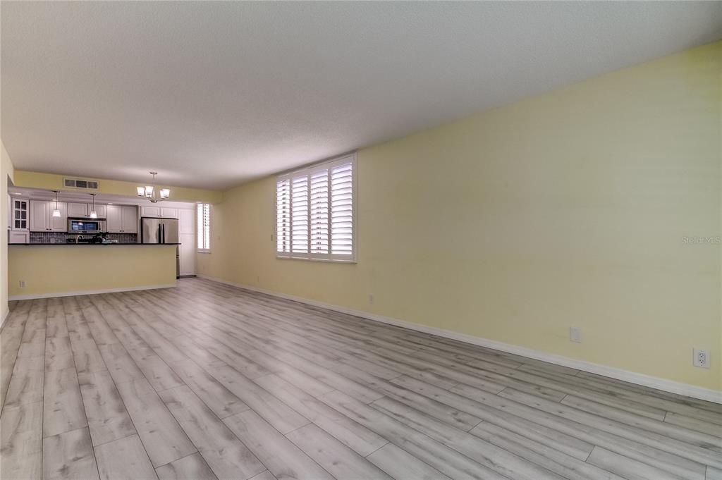 LIVING ROOM LOOKING INTO KITCHEN