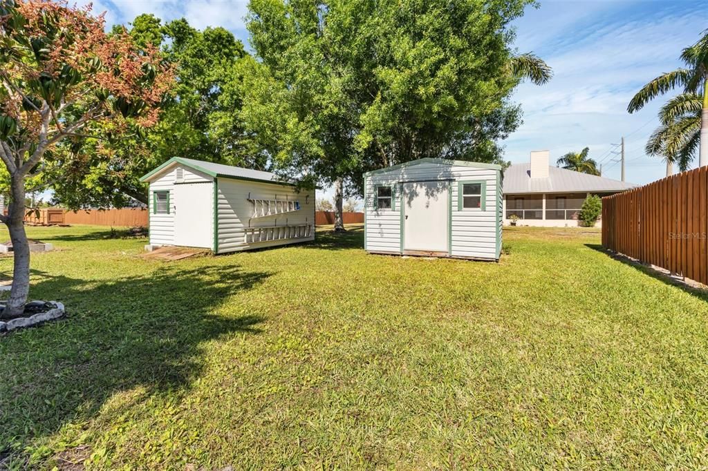 Two storage sheds 12 x 8 and 16x10. Good possible playhouse too.