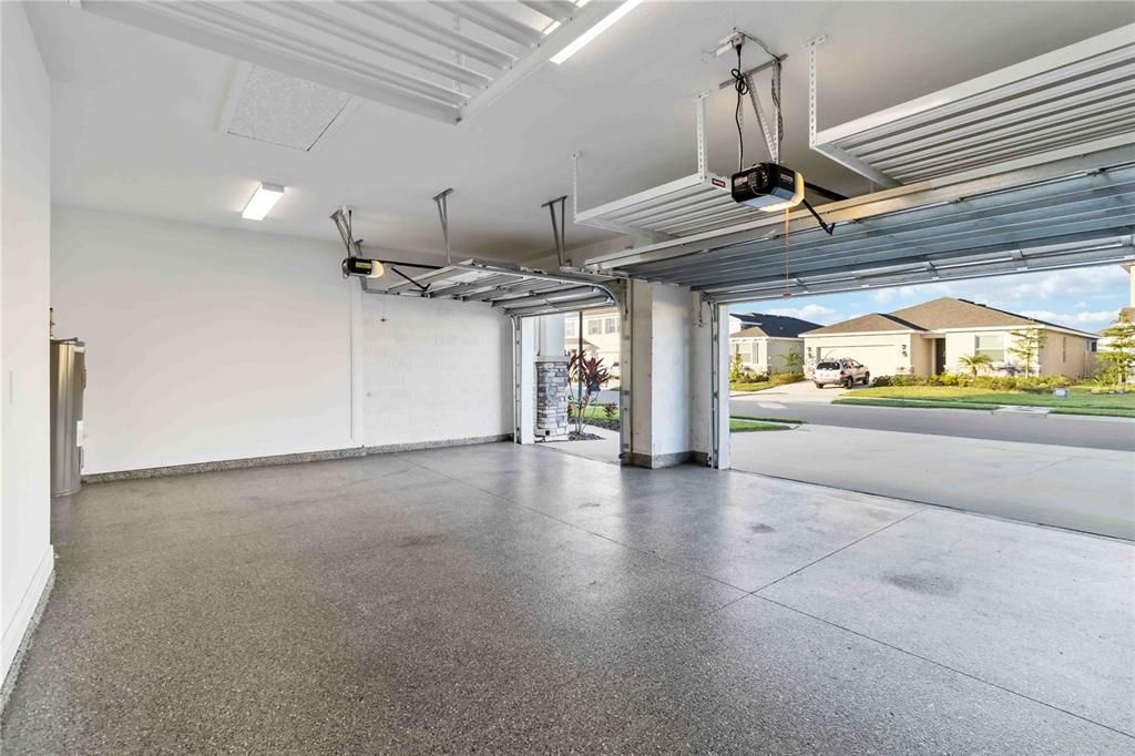 3 Car Garage with extra Storage Space and Epoxied Floor