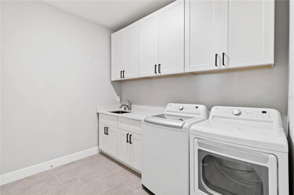 Large Laundry Room with extra Cabinets, Wet sink and Counter Space