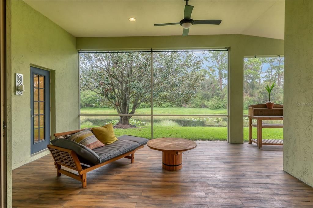 Screened-in lanai with stunning lake views