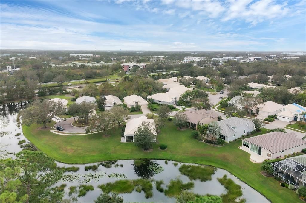 Aerial showing the full lot backing up to the lake.