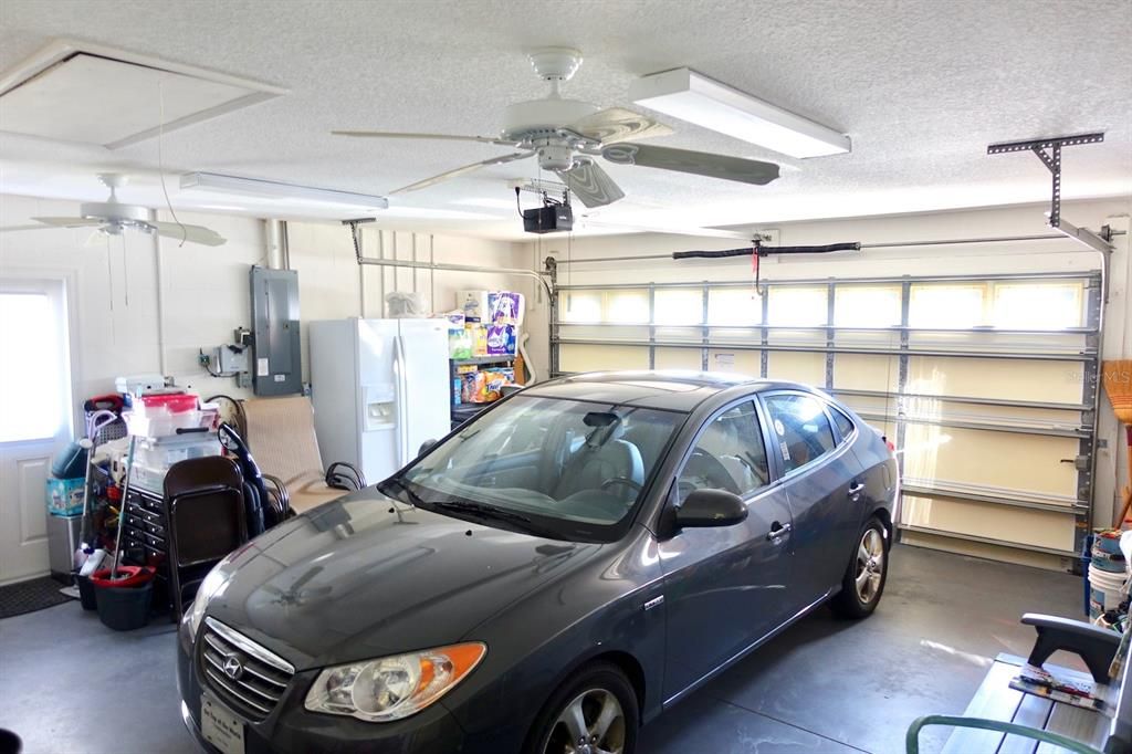 2 CAR GARAGE W/ GOLF CART AREA