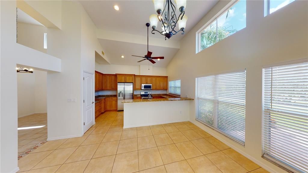 Kitchen with pantry and eat-in area.