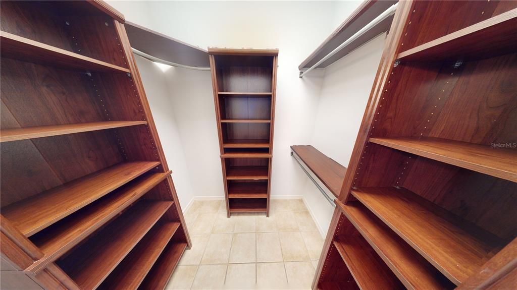 Primary Bedroom Walk-In Closet off of the Primary Bathroom