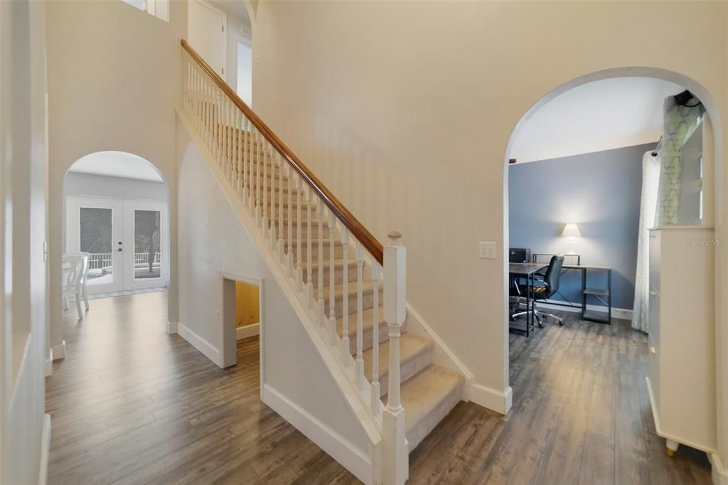 TWO-STORY FOYER.