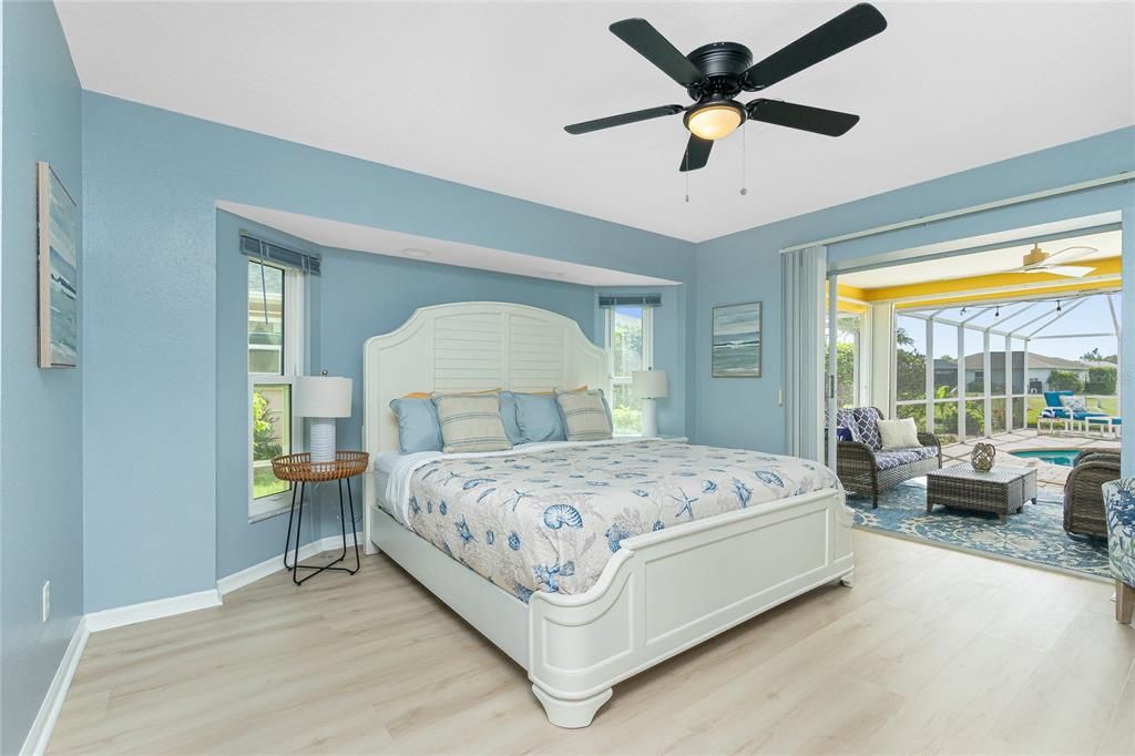 Primary Bedroom with Sliding Doors out to the Patio