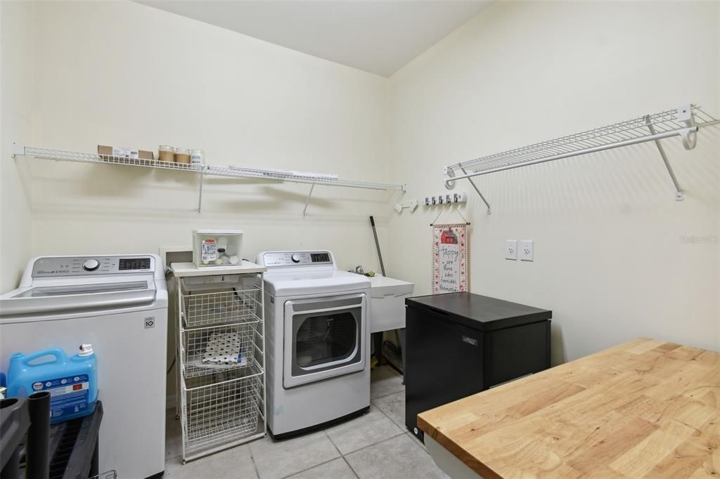 Large laundry room with sink