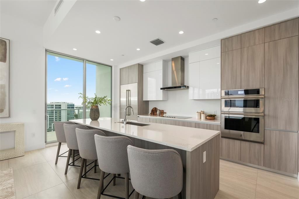 Generous Quartz topped counters and island