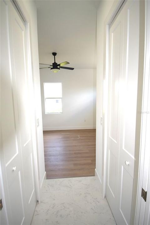 Hall - view from principal bathroom to principal bedroom.