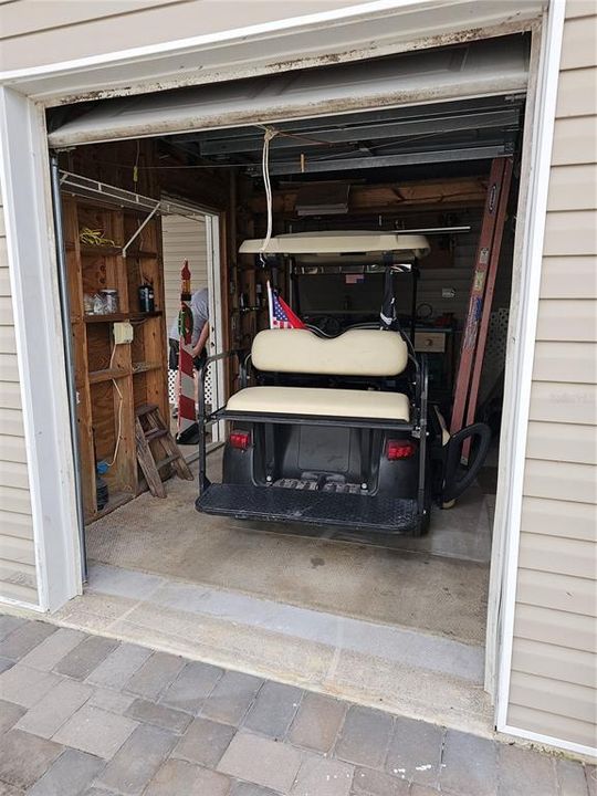 Rolling garage door shed