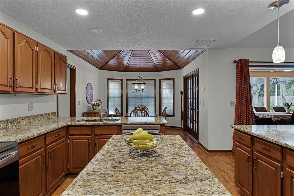 Kitchen with upgraded granite countertops and stainless steel appliances