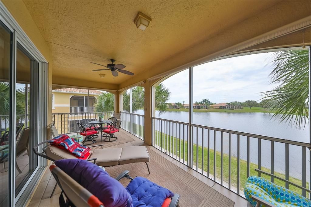 Enclosed screened lanai with waterview!  NOTICE the sun shades in case the sun is a little too bright.