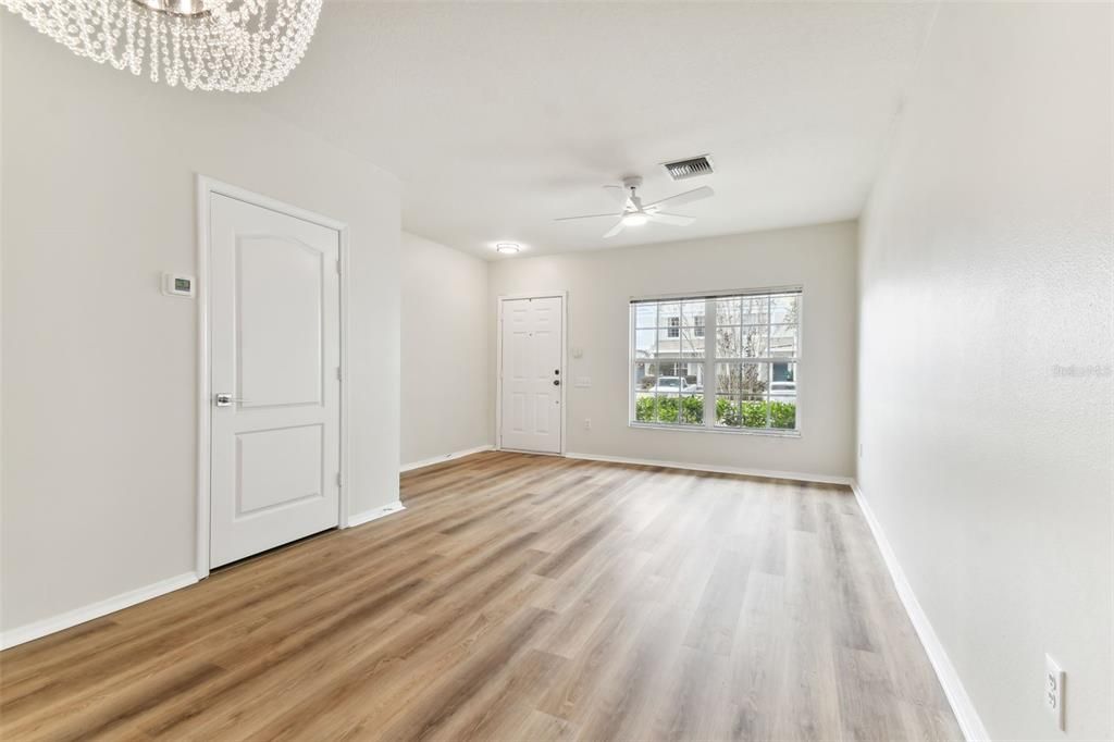 Living/Dining room flows seamlessly over breakfast bar into kitchen