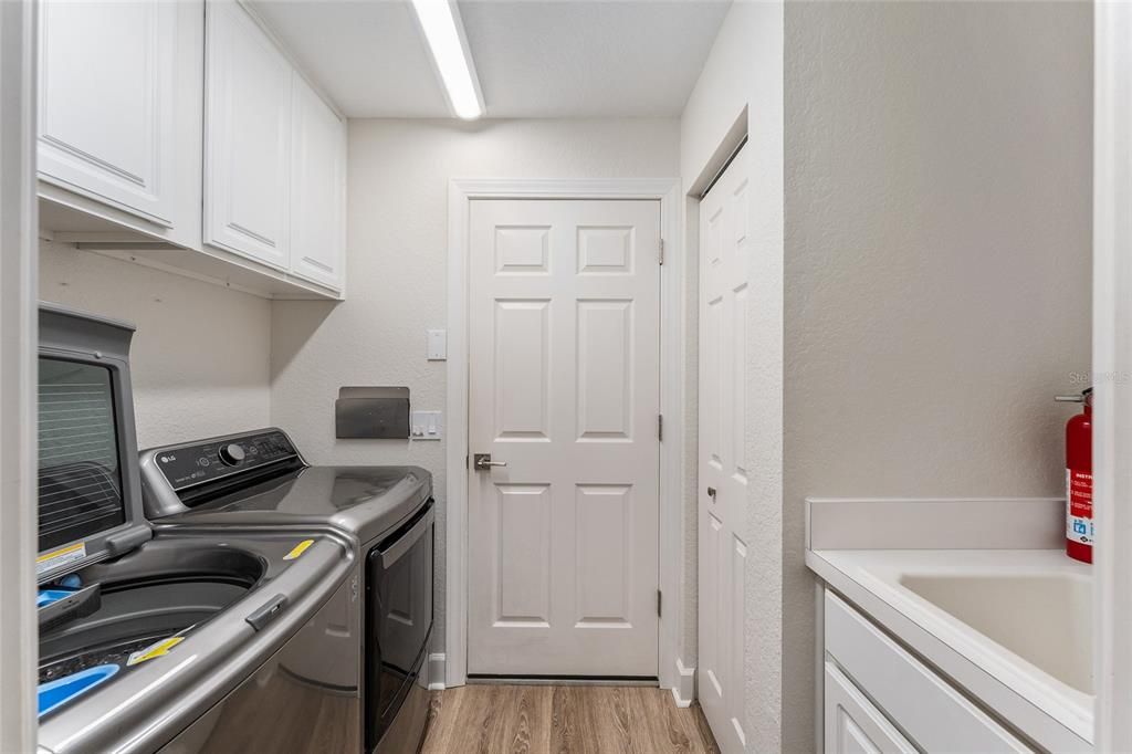 Laundry with Additional Cabinets