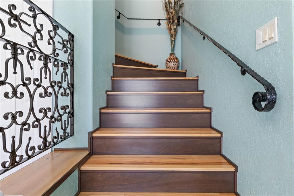 Beautiful wooden staircase with a custom handrail