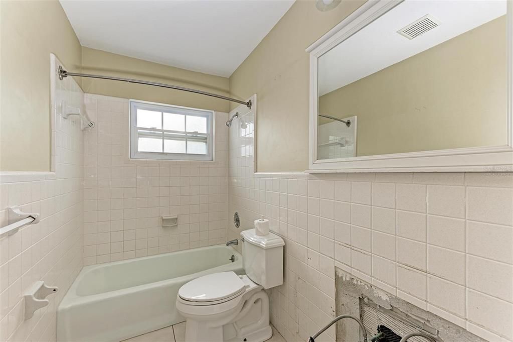 Virtually staged second bathroom