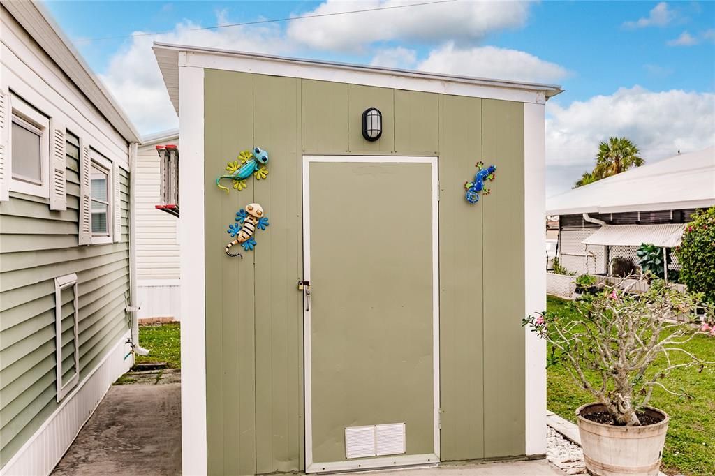 Shed features laundry and extra storage