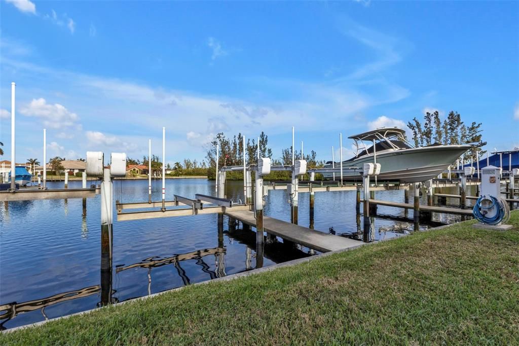 Boat dock & lift right outside your lanai