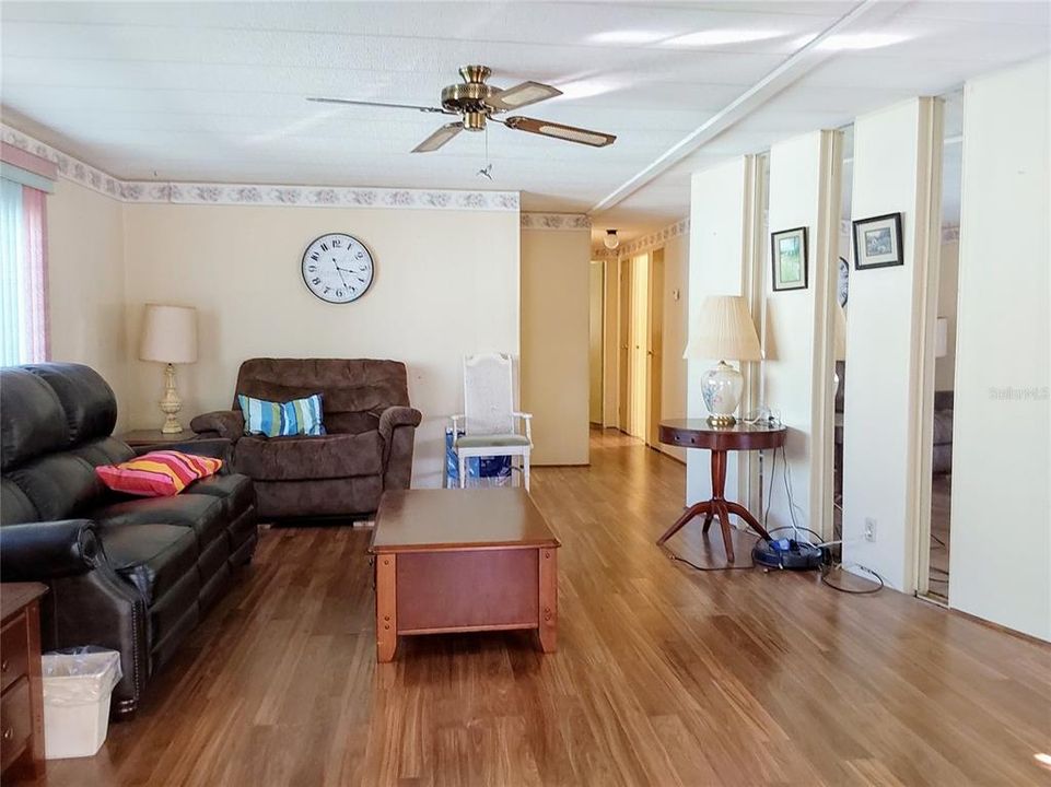 View at entrance of Livingroom and Hall to Bedrooms and Bath