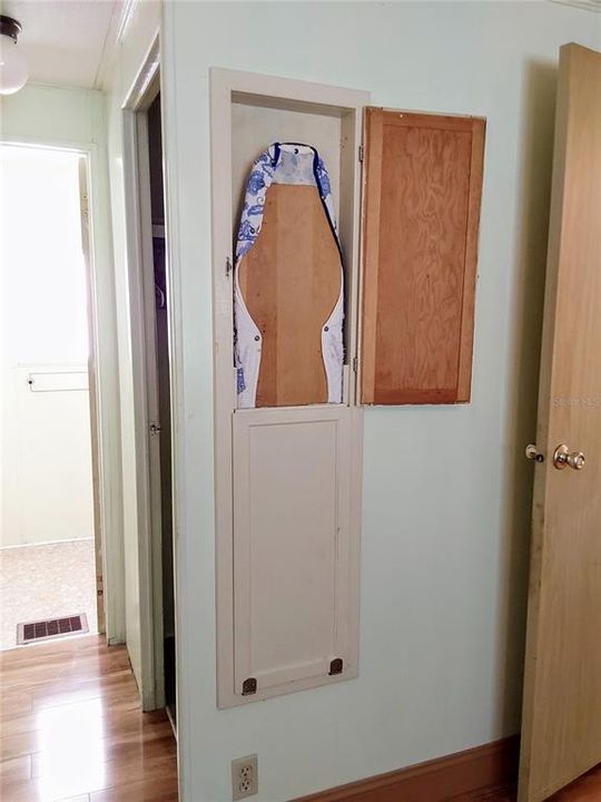 Ironing board in wall in Primary Bedroom