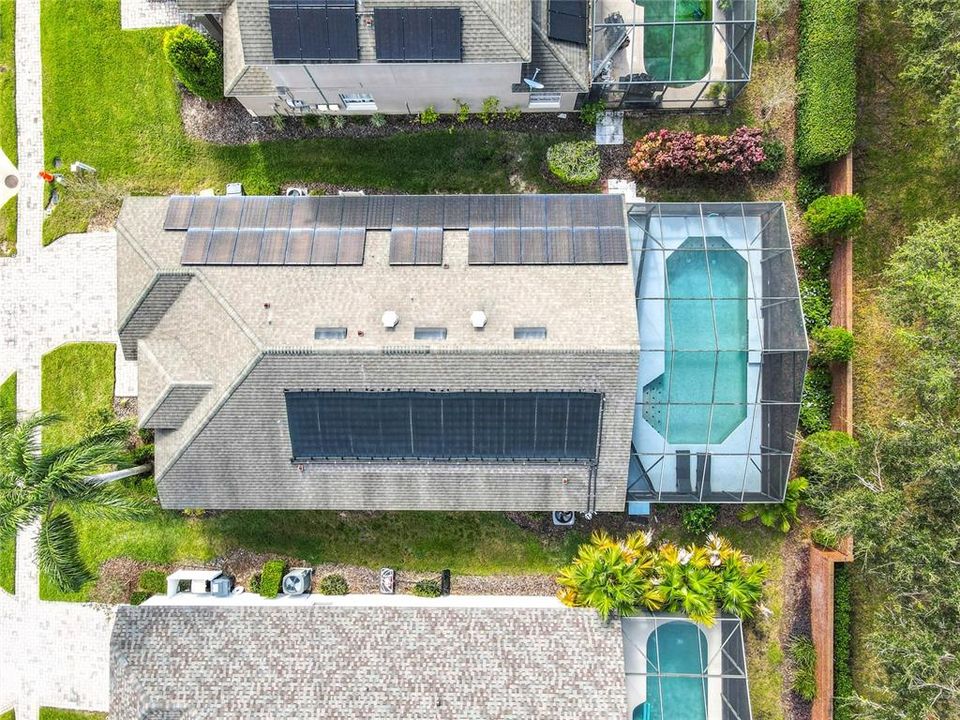 An aerial view of the home showing the solar panels.