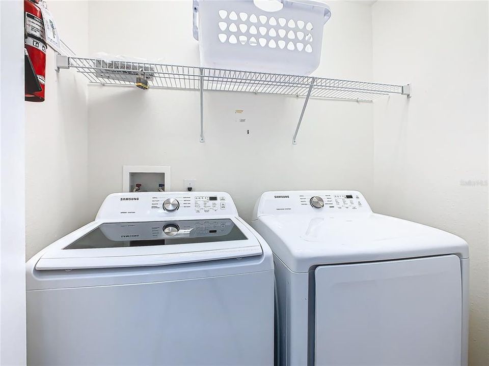 The laundry closet is located inside the home.