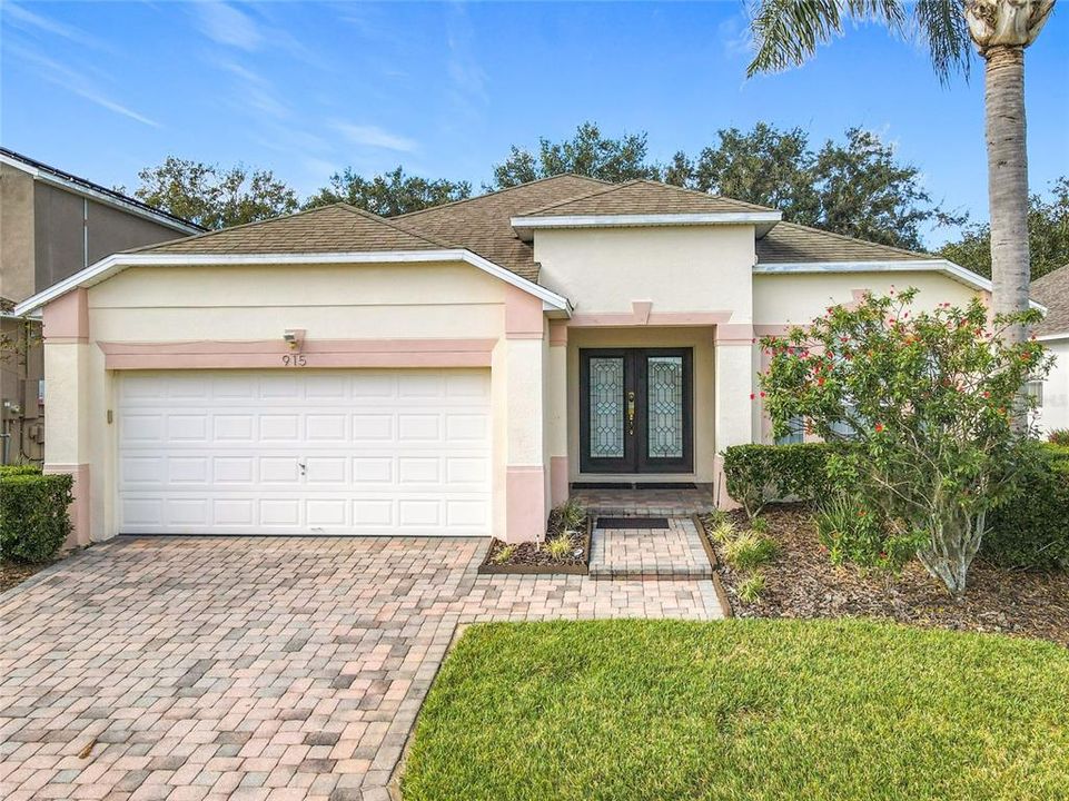 Double doors lead you into the home.