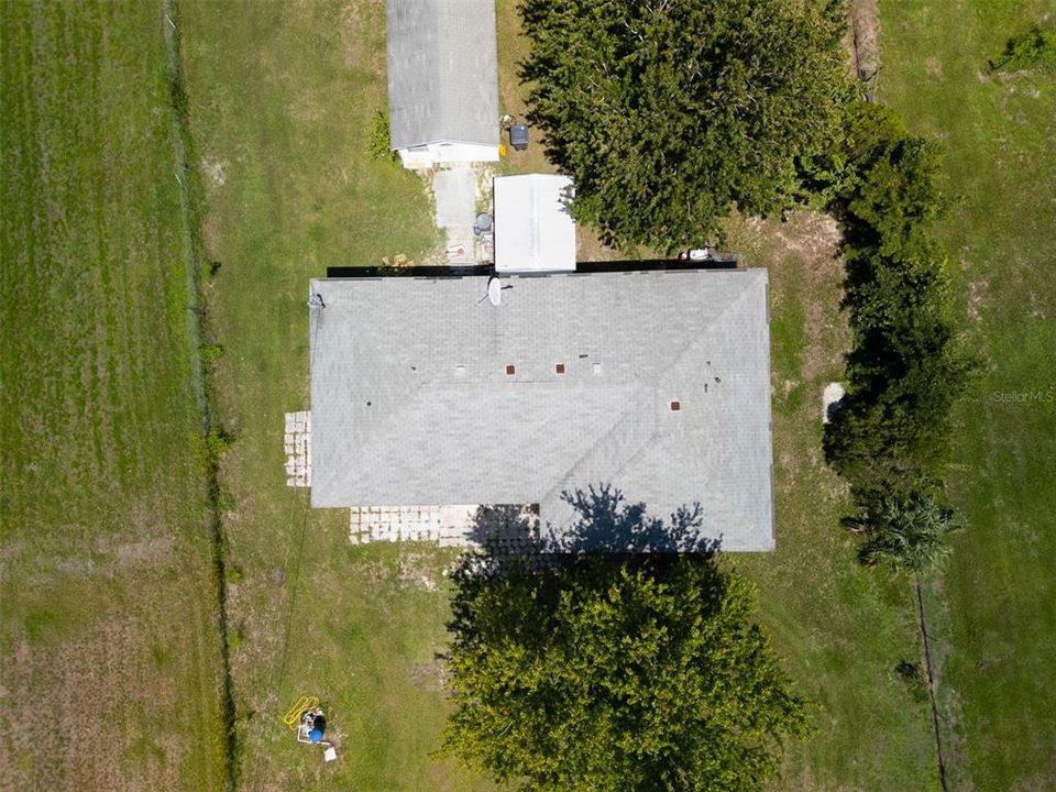 Aerial of the home, workshop and shed