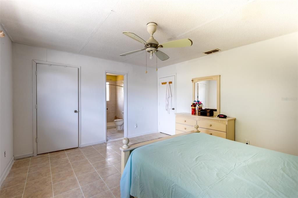 Primary bedroom with ensuite bathroom