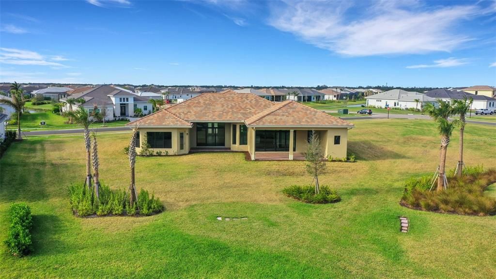 Large back yard with plenty of room for a pool.