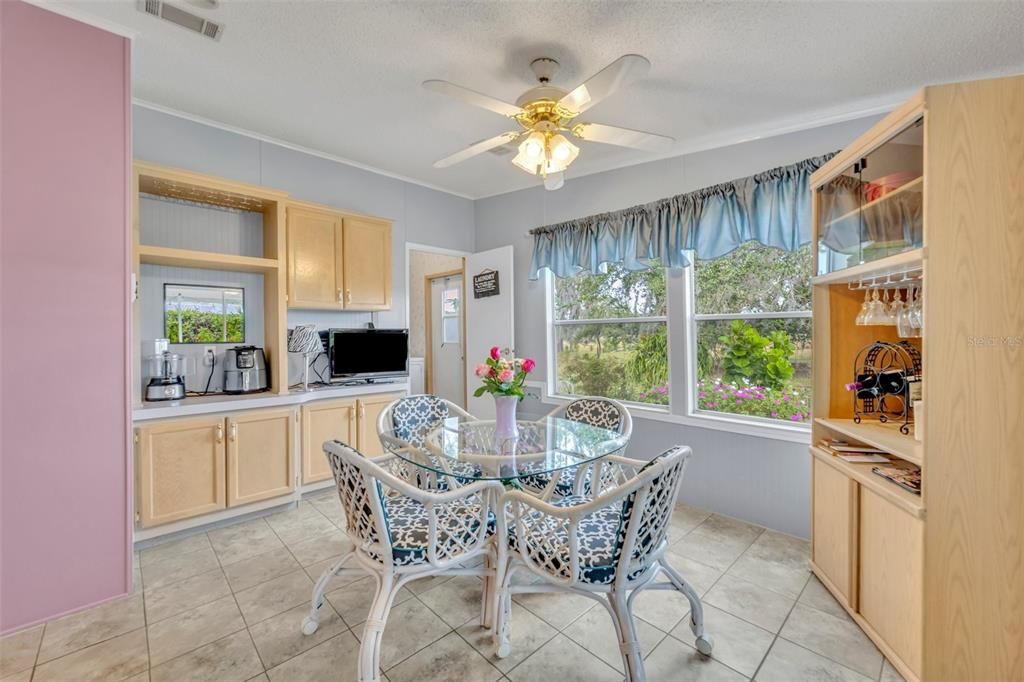 Eat in area adjacent to kitchen with view to back garden and open fields