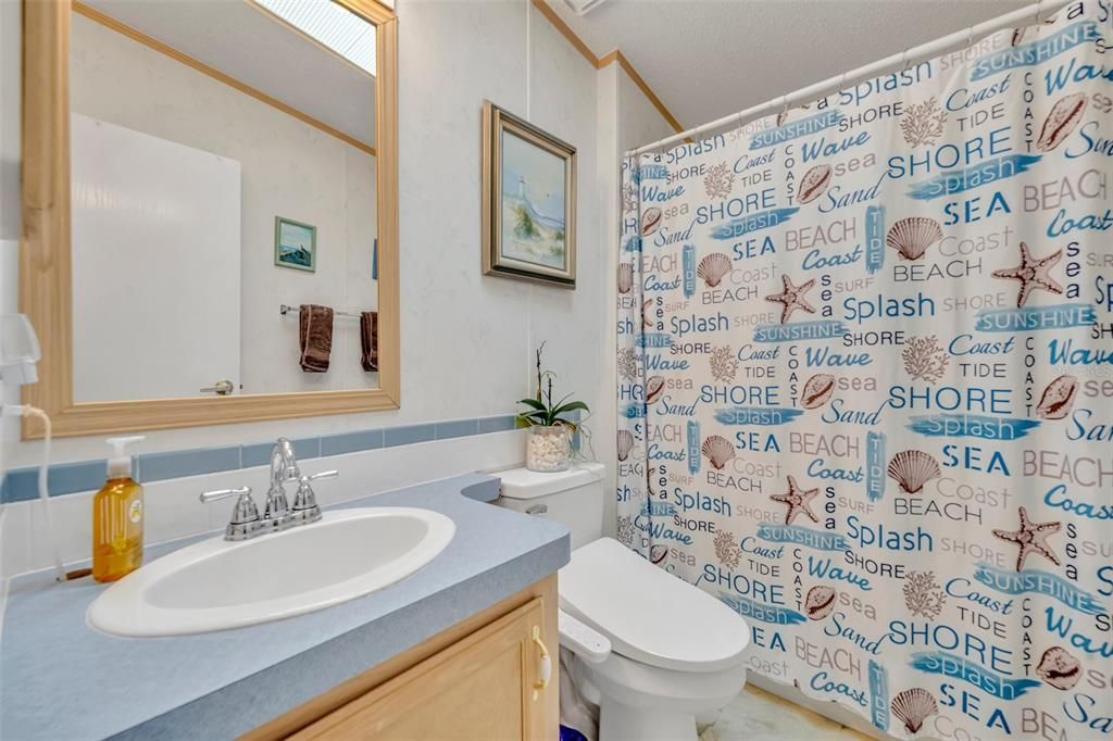 Second bathroom, with tub and shower