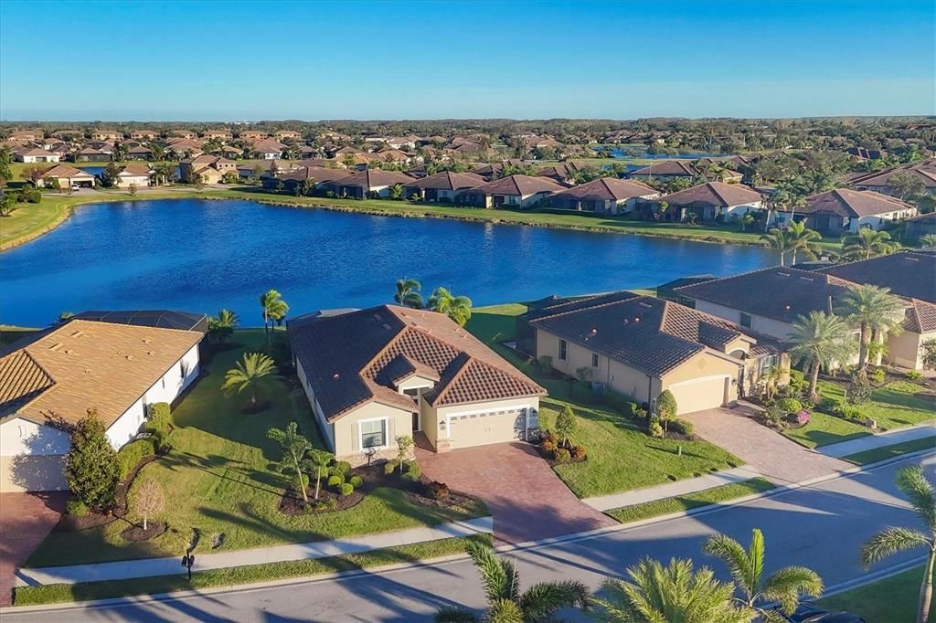 Front of Home Aerial With View of Lake