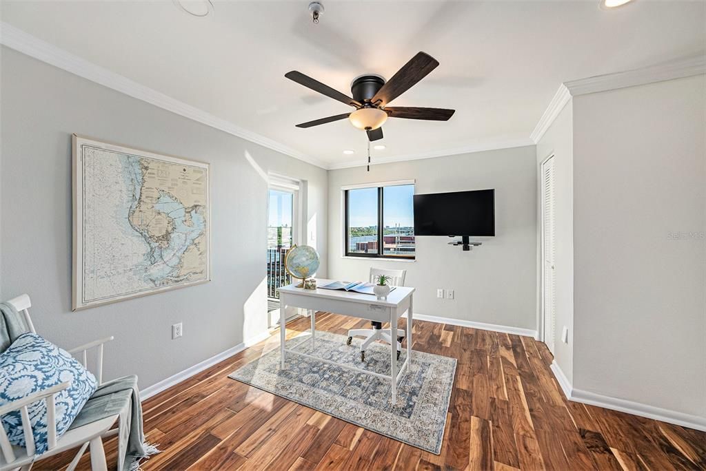 3rd bedroom, currently used as an office.  Features a private balcony with views of the Intracoastal.