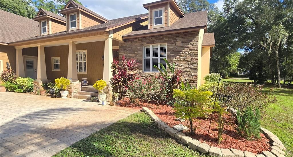 LOVELY FRONT PORCH WITH STACKED STONE ACCENT