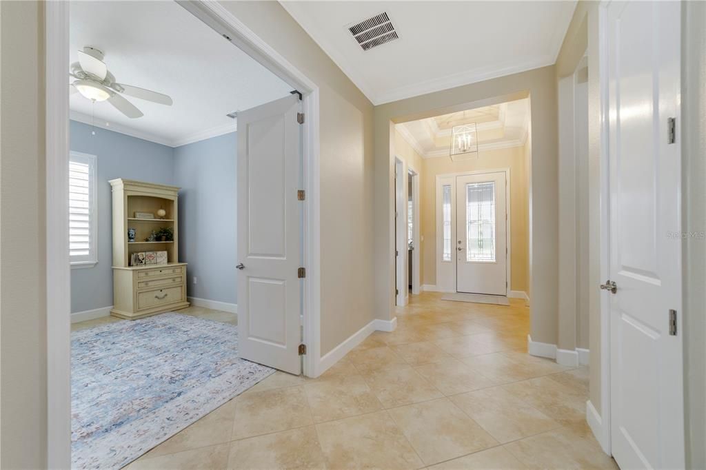 Looking back at the door. Office space on immediate left, guest bedroom towards the front left of the front door, laundry room to the right