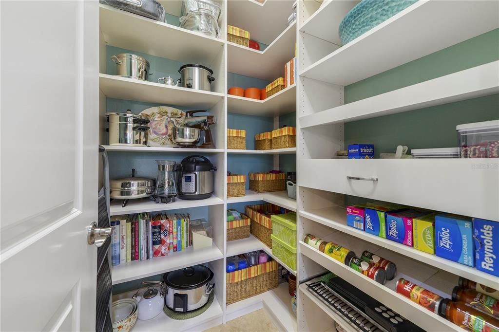 Kitchen pantry with custom built in organizers