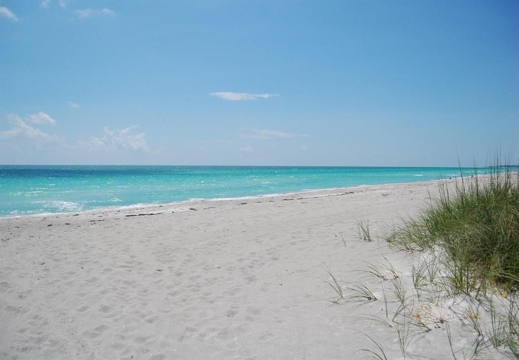 Beautiful, soft, white sandy beach just across the street