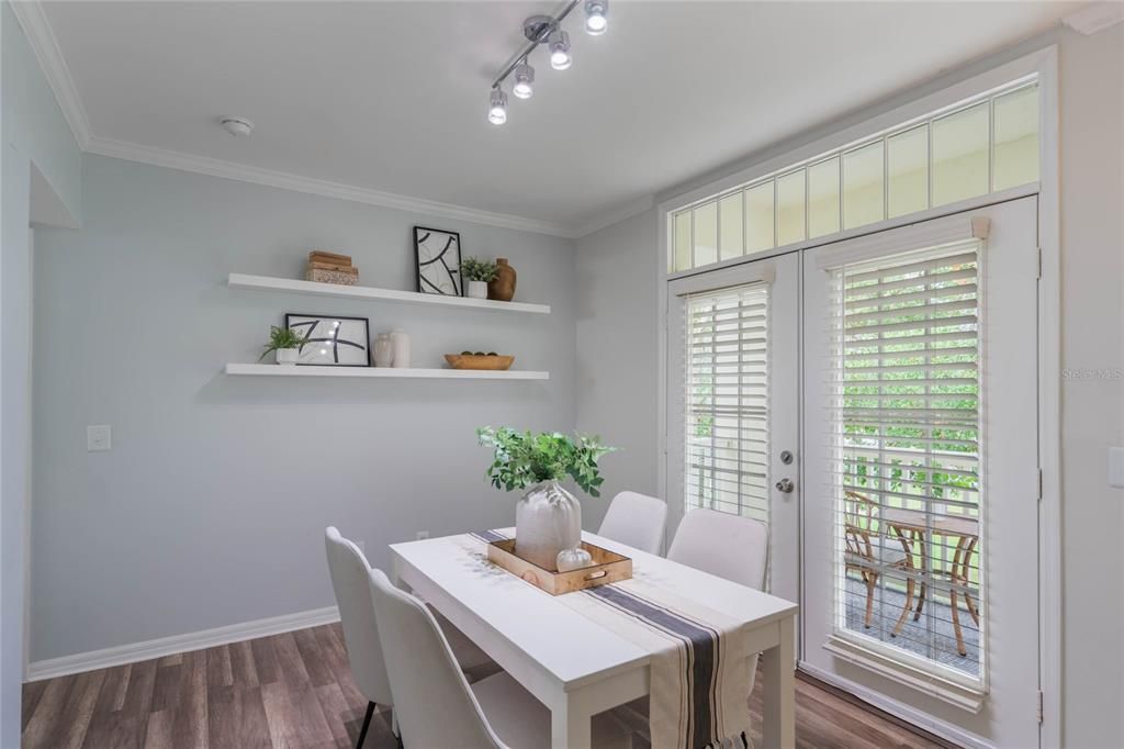 Dining Area with french doors to balcony