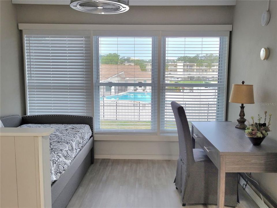 Enclosed Family Room with Day Bed and Desk