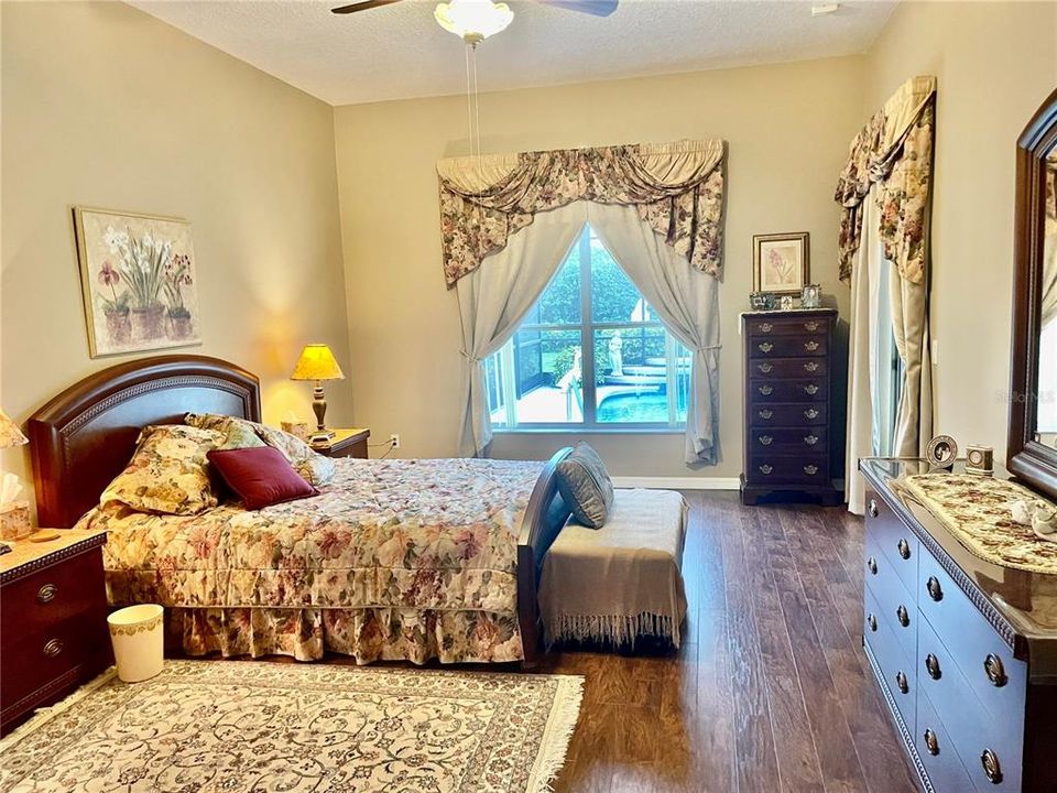 MASTER BEDROOM that OVERLOOKS POOL