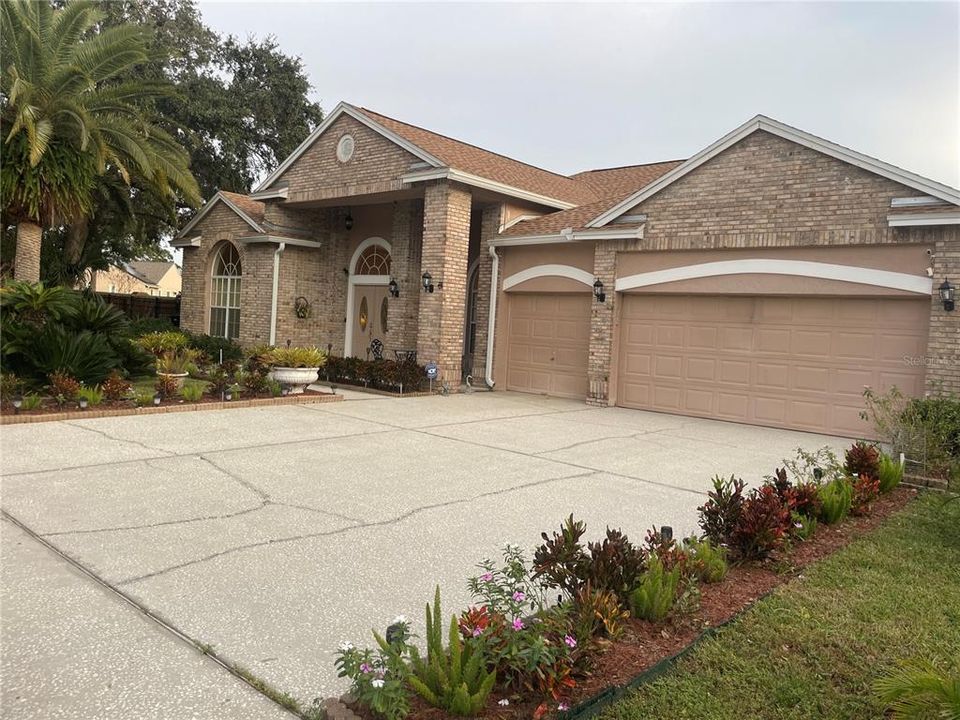 Exterior featuring 3 car garage