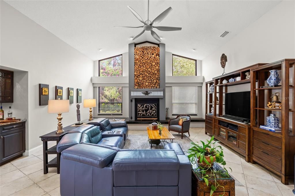 Family room with bar and woodburning fireplace